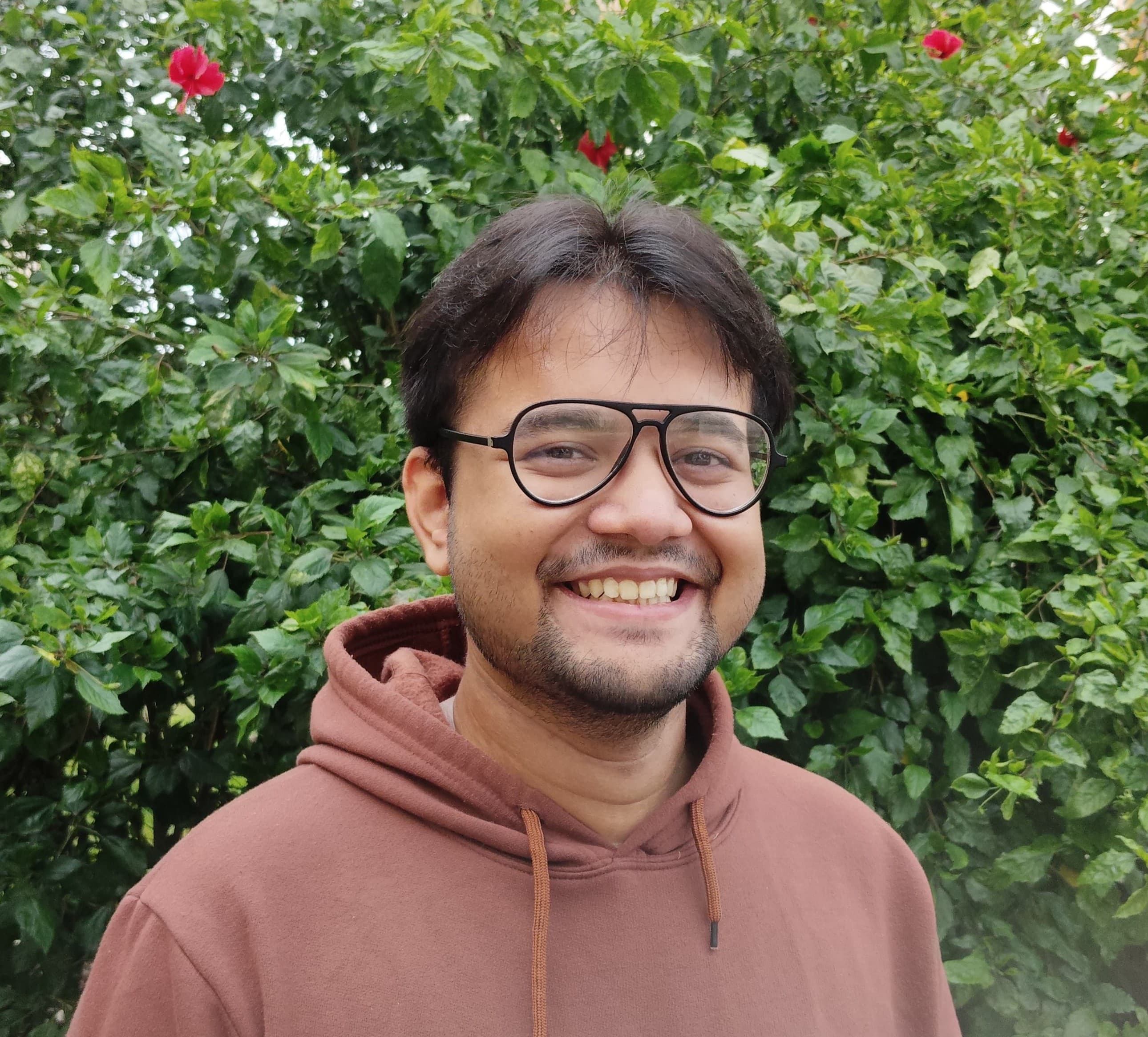 Portrait of Bhargav Mahanta smiling outdoors